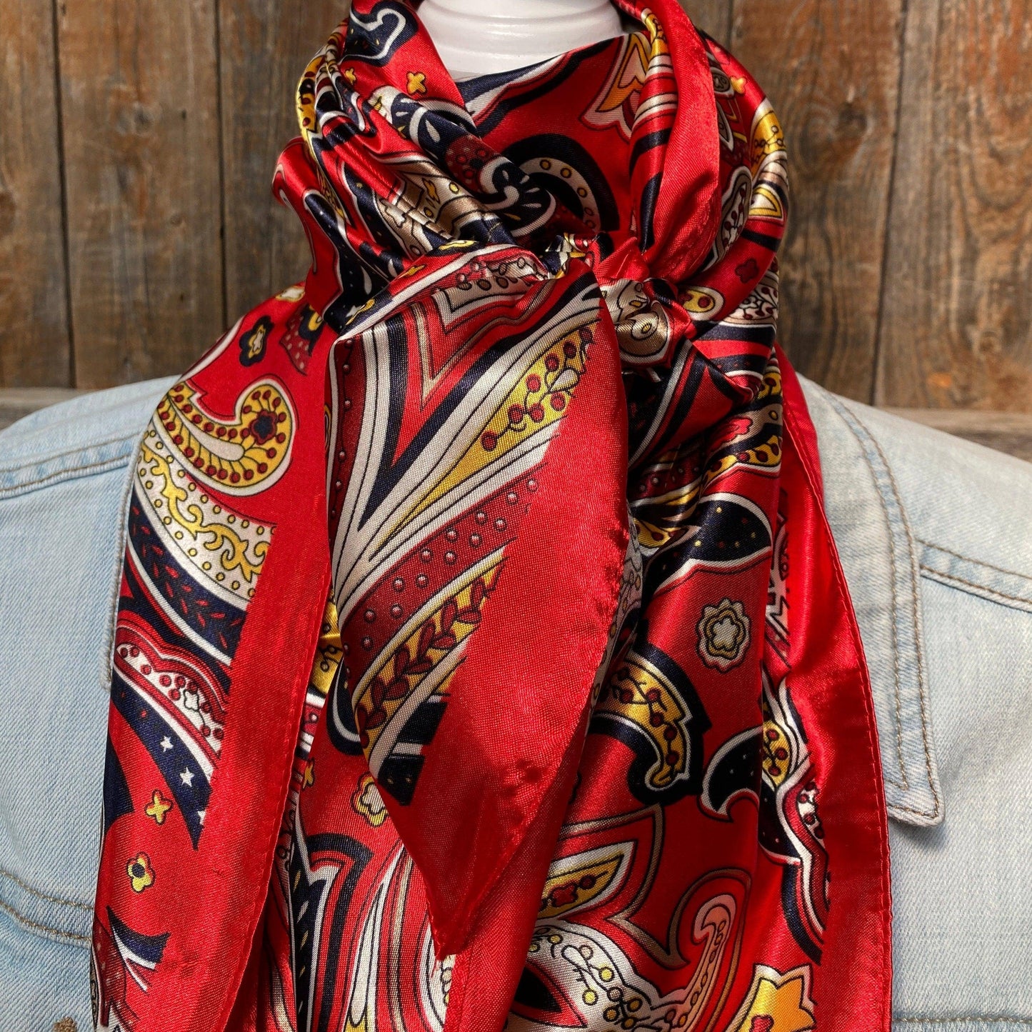 Ruby Red Hippie Paisley 35 inch western wild rag scarf for women styled as a cowgirl neck scarf.
