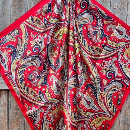 Ruby Red Hippie Paisley 35 inch western wild rag scarf for women styled as a cowgirl neck scarf.