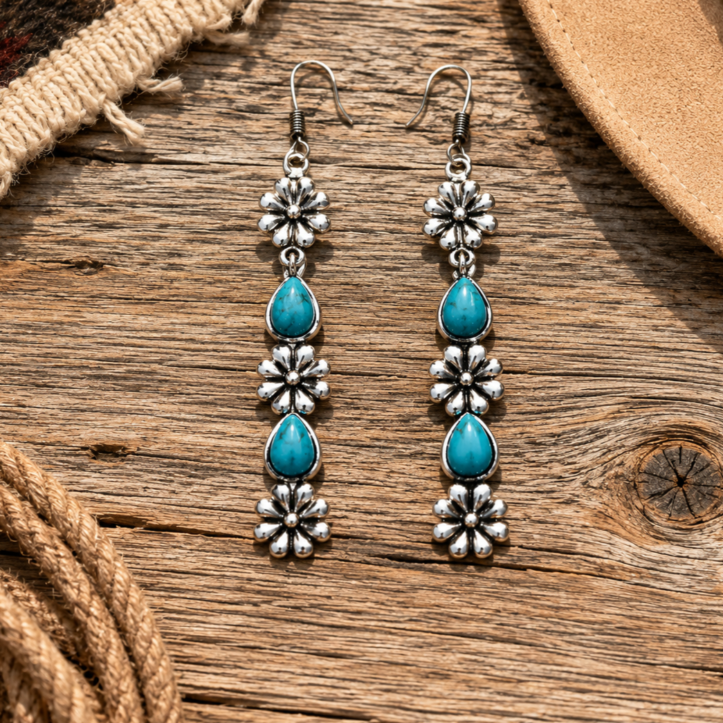 Pair of silver earrings with turquoise stones