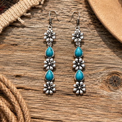 Pair of silver earrings with turquoise stones