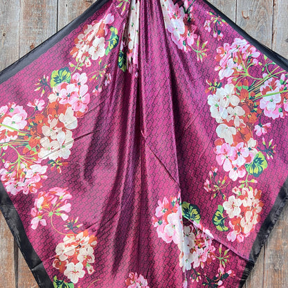 Dark pink cherry blossom western wild rag scarf styled as a silky cowgirl neck scarf for rodeo and western fashion.