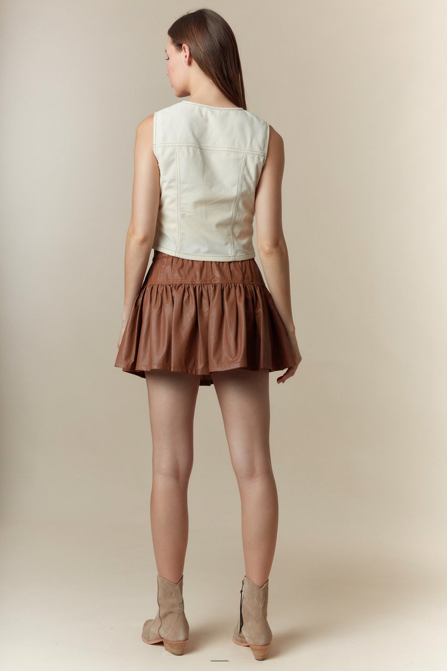 Faux Leather Bow-Tied Ruffle Mini Skirt with Pin-Tuck Detail