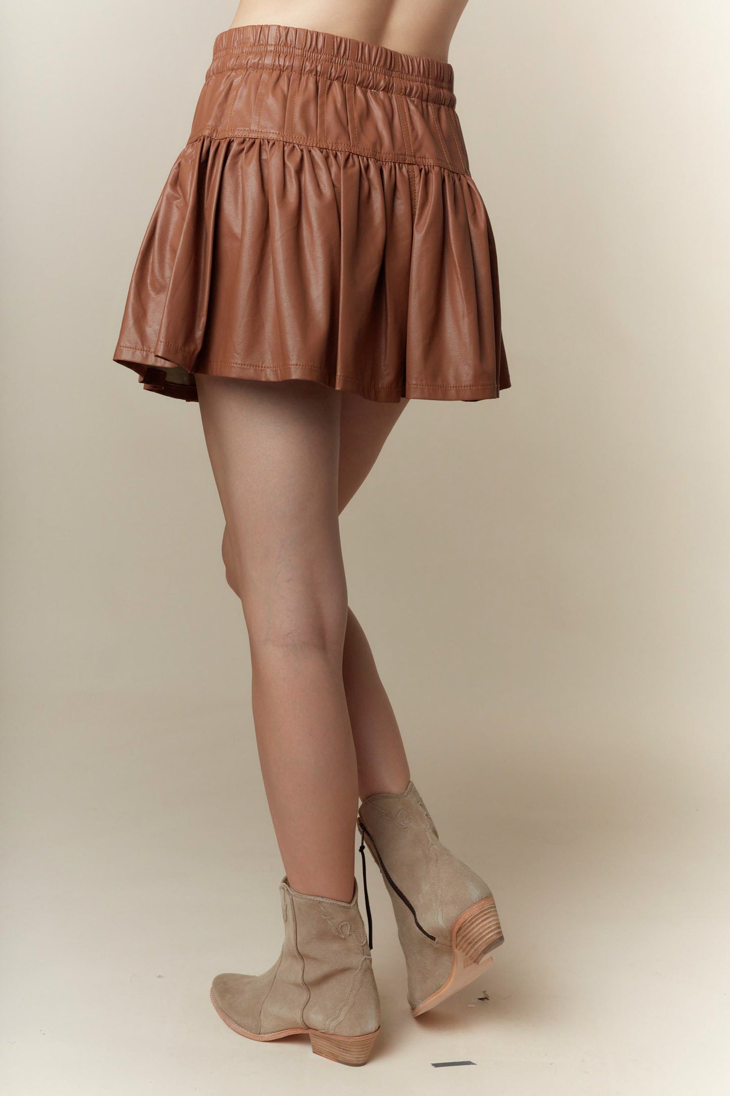 Faux Leather Bow-Tied Ruffle Mini Skirt with Pin-Tuck Detail